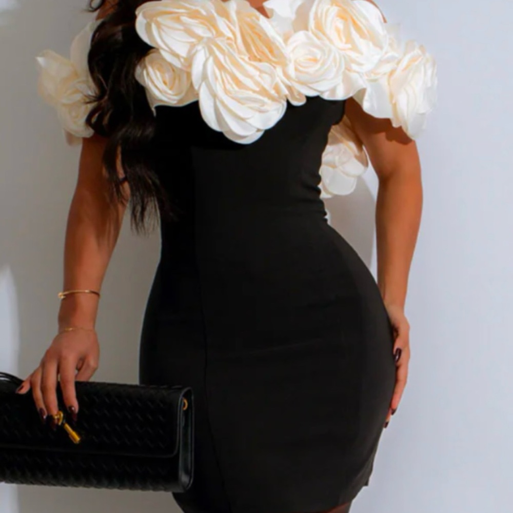 Elegant Black Dress with Cream Floral Accents